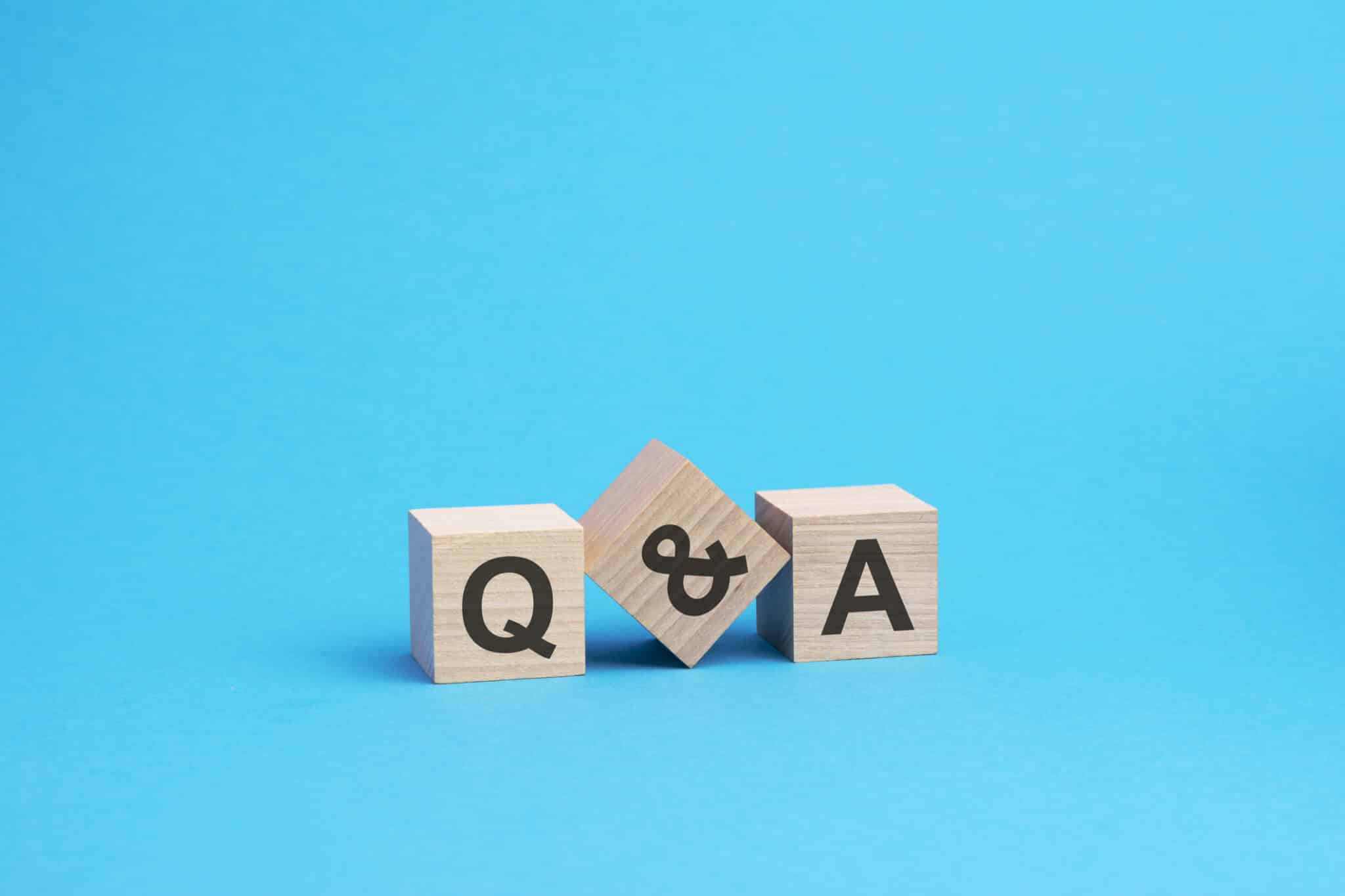 Q and A text on wooden blocks, Pipe Leak Repair.