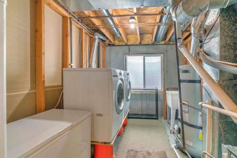 Laundry standpipe clearing to stop washer overflows.